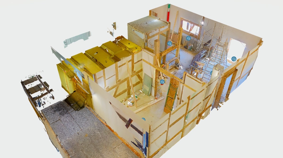 Eine digitale 3D-Baustellenansicht mit Holzrahmen und Baustruktur in hellen Farben.